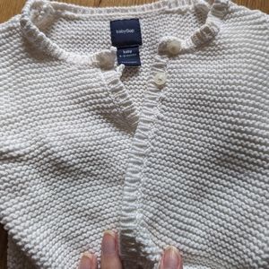 Cable knit baby sweater